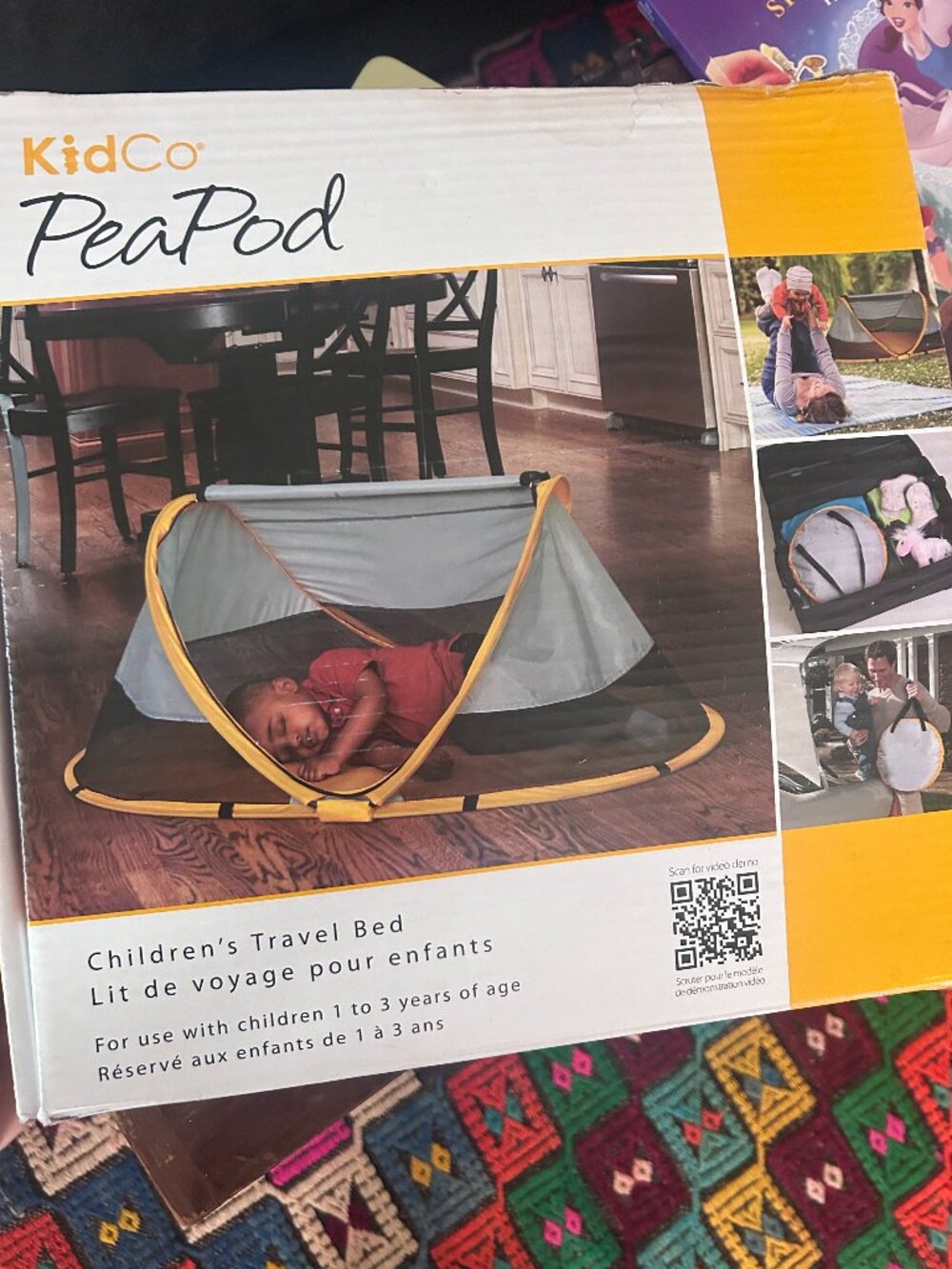 Kidco PeaPod travel bed in sunshine